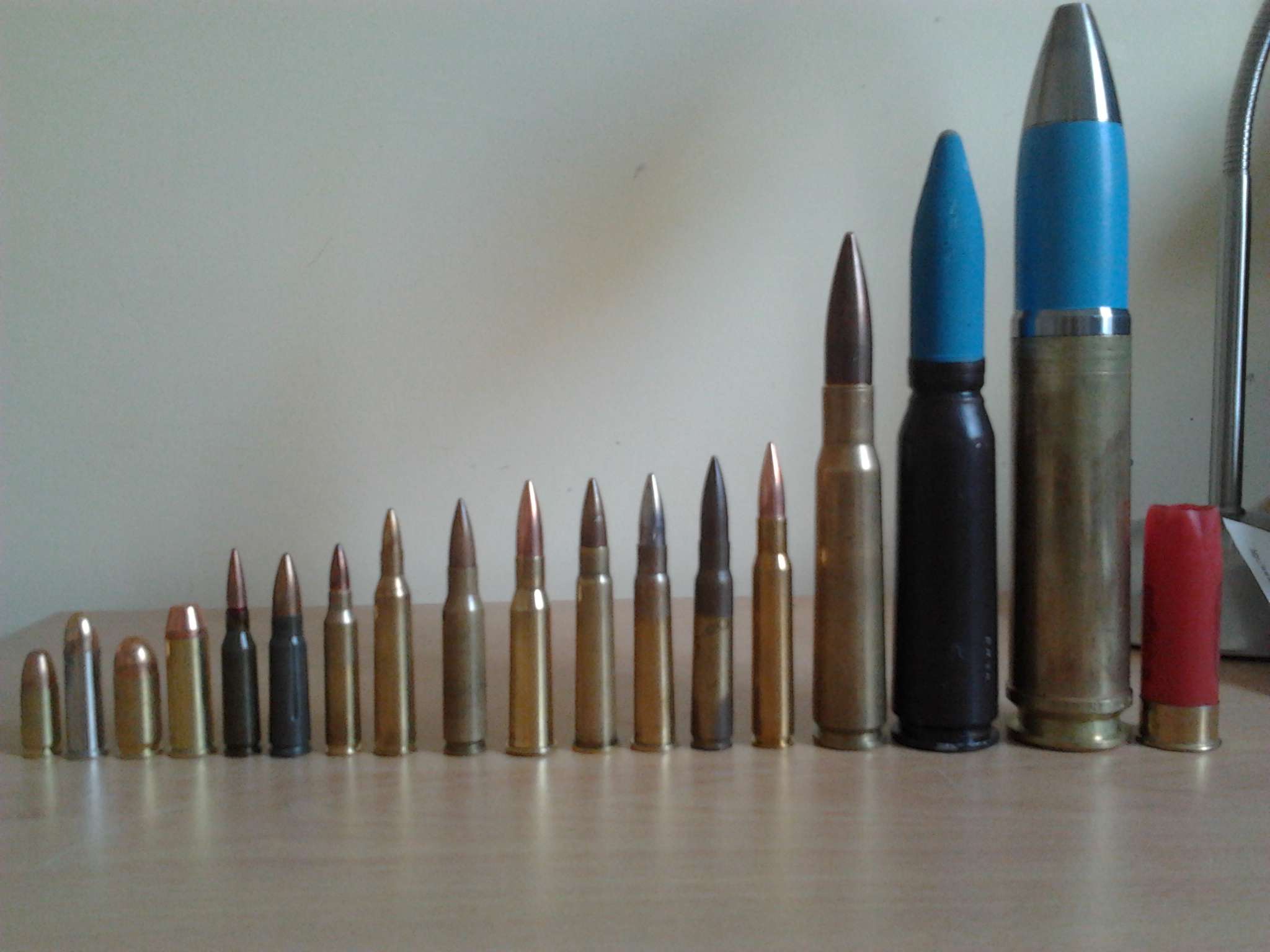 From left to right: - 9mm parabellum - .38 special - .45 ACP - .44 Magnum -...